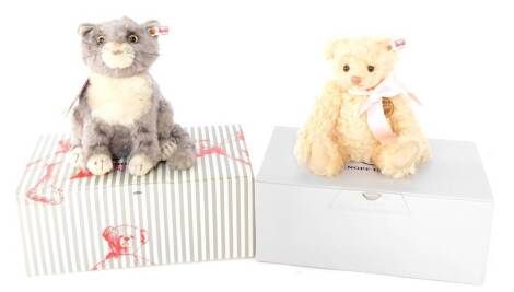 A Steiff figure modelled as Mog The Forgetful Cat, with certificate no. 60211, together with a Royal Baby "Charlotte" mohair blond Teddy bear, with certificate no. 664809, both boxed. (2)