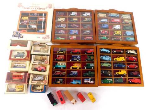 Matchbox Lledo Corgi and other die cast vehicles, boxed, Vanguards and other empty vehicle boxes, models of vintage delivery vans, buses, and cars, a Berkertex Collectables glass fronted display cabinet and four other collectors display cabinets. (a quant