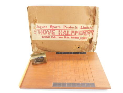 A Jaguar Sports Products Shove Ha'penny board, boxed, together with a Lledo Radio Times Model A4 delivery van, boxed. (2)