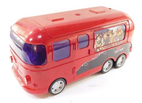 An MGA Entertainment Bratz Rock Angelz red tour bus, with a fitted interior, 56cm wide.