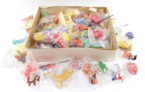 McDonalds toys, in sets. (a quantity)