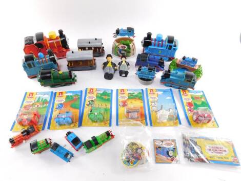 Thomas The Tank Engine collectables, including clockwork trains, bubble bath trains, batteries, Fat Controller figure and Tomy clockwork trains, etc. (a quantity)