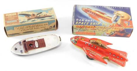 A Mettoy Dan Dare Spaceship "Eagle", article number 8230, together with a penguin clockwork powered tug boat "Annie", no key, both boxed. (2)