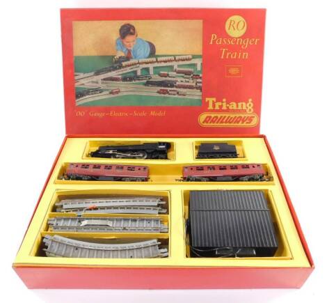 A Tri-ang Railways OO gauge passenger train set, containing Princess Elizabeth, British Rail black livery, 4-6-2, 46201, tender, two coaches, track and control unit, boxed.