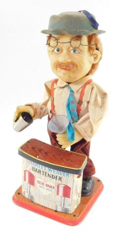 A Rosko tin plate battery operated Charley Weaver Bartender.