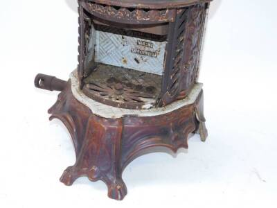 A Welsbach Kern portable cast iron and enamel gas radiator, c1900, with leaf moulded decoration. Auctioneer Note: We have specific vendor instructions to sell WITHOUT RESERVE. - 3