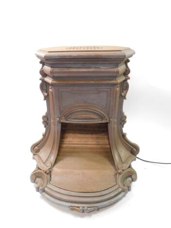 A Continental late 19thC cast iron and copper heater, of shaped scrolling form, converted to electricity, 68cm high, 48cm wide, 53cm deep. Auctioneer Note: We have specific vendor instructions to sell WITHOUT RESERVE.