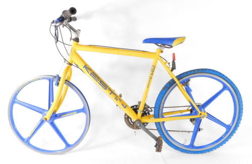 A British Eagle Kestin yellow and blue mountain bike, with 26" aluminium wheels, and 21 gears, Vuelta saddle.