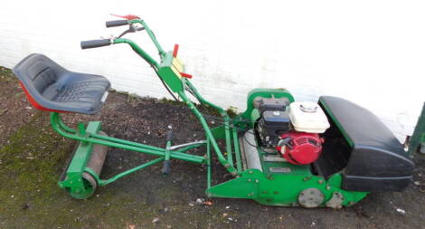 A Dennis Simplex ride-on lawnmower, model no 0510, c2007, serial no 0 510 108, manual and other paperwork.