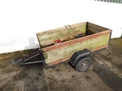 A wooden and metal framed two wheel trailer, 152cm wide, 90.5cm deep.