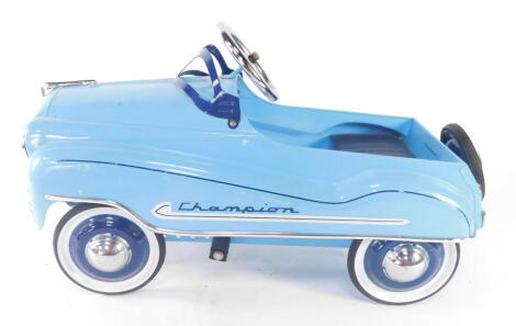 A vintage 'Champion' painted steel pedal car, 100cm long.