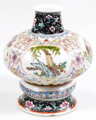 A Chinese porcelain vase, of compressed baluster form, hand painted with panels of cats, flowers and trees, broken by fixed areas of flower heads and scrolls in raised enamels, on a circular turquoise foot with double line rounded square Yongzheng mark to - 2