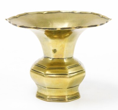 A 19thC Chinese bronze vase, with flared rim and octagonal baluster body, 10.5cm high, 13.5cm diameter.