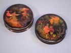 A pair of Russian papier mache circular boxes and covers