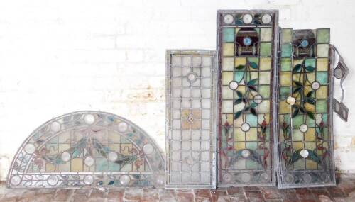 Four Victorian leaded glazed panels, of various sizes, including an arch, 50cm high, 106cm wide. (AF)