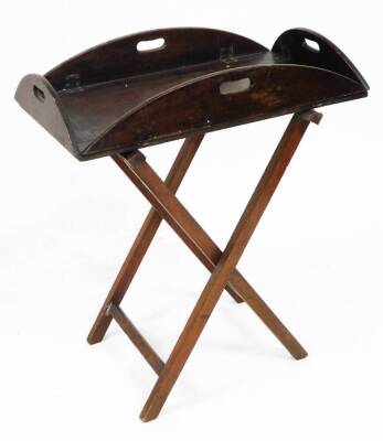 A 19thC mahogany butler's folding tray and stand, 76cm x 45cm.