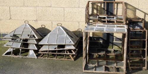 A selection of Victorian cast iron garden cloches.