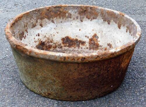 A Victorian cast iron bowl, 42cm diameter.