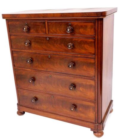 A Victorian flame mahogany chest, of two short and four graduated drawers, with knob handles having mother of pearl centres, 126cm high, 112cm wide, 56cm deep.