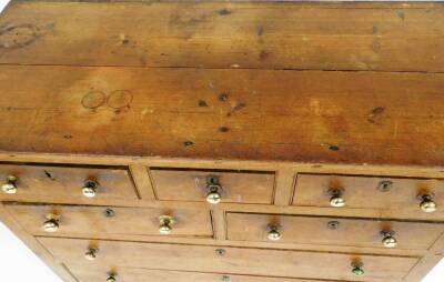 A 19thC pine chest, of three over two short drawers over two long, with brass knob handles, 100cm high, 124cm wide, 53cm deep. - 2