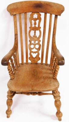 A Victorian ash and elm Grandfather chair, of large proportions, with pierced splat back saddle seat and double H frame stretcher. - 2