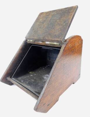 An Edwardian oak coal scuttle, with brass hinges and fixed handle, 39cm high. - 2