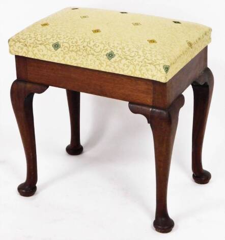 A early 20thC mahogany dressing stool, with top with cream and gold upholstery with floral scroll and flowers, on a mahogany base, with splay feet, 54cm high, 53cm wide, 36cm deep.