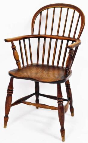 A 19thC Lincolnshire ash and elm Windsor chair, the shaped back, with bobbin turned supports, stamped G. WILSON, GRANTHAM on seat, 100cm high, 54cm wide.