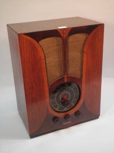 A 1937 Philco walnut veneered radio in the Art Deco style with