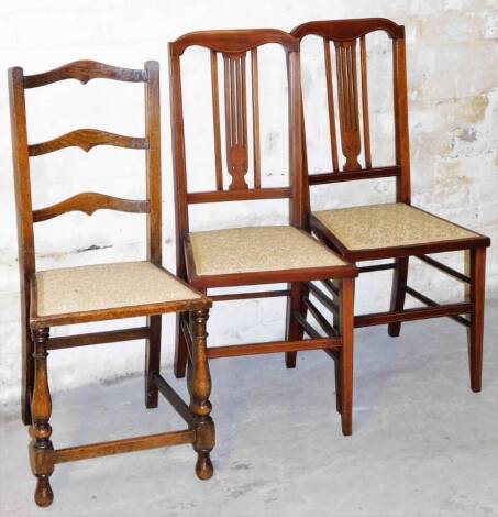 Various chairs, comprising a pair of Edwardian mahogany and boxwood strung salon chairs, each with vertical pierced splats, overstuffed seats and square tapering front legs, joined by horizontal stretches, 88cm high, and an oak ladder back chair with simi