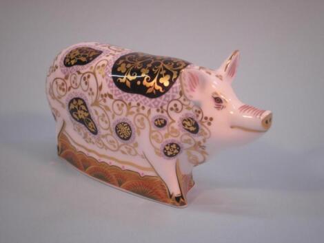 A Royal Crown Derby porcelain figure of the spotted pig