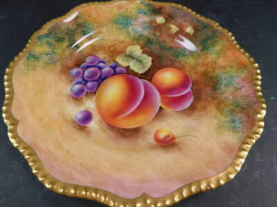 A Royal Worcester porcelain cabinet plate, signed Leaman, painted with peaches and black grapes, 22cm diameter. - 2