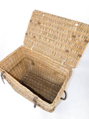 An early 20thC bamboo and cane dog basket, the hinged lid bearing an enamel plaque "Live Dog, With Care", with leather straps and rope carrying handles, 86cm high, 91cm wide, 56cm deep. - 3