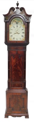 Joseph Wilson of Stamford. An early 19thC flame mahogany longcase clock, the enamel break arch dial with moon phase, painted spandrels of cornucopia, the dial bearing Roman numerals, subsidiary seconds dial, eight day two train movement with bell strike,