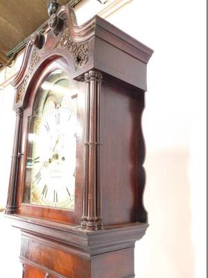 Joseph Wilson of Stamford. An early 19thC flame mahogany longcase clock, the enamel break arch dial with moon phase, painted spandrels of cornucopia, the dial bearing Roman numerals, subsidiary seconds dial, eight day two train movement with bell strike, - 7