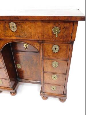 An early 18thC and later adapted walnut kneehole bachelor's secretaire chest, with folding top and raised on bun feet, 87cm high, 87cm wide, 58cm deep. - 10