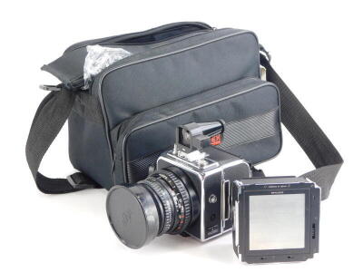 A Hasselblad Superwide CW camera, with f4.5, 38mm Biogno lens and instruction book, with Plus A12 and A24 FIM backs. - 2