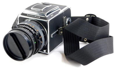 A Hasselblad 501cm camera, with Zeiss Planar F3.5 100mm lens, WLF and A12 film back.