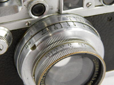 A Leica III camera, serial number 163566, with a Leitz 5cm f2 Summar lens, number 403494, in a leather case. - 3