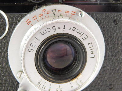 A Leica camera, with black body, believed by the Leica Society to be a Leica II conversion, serial number 20916, with a Leitz 5cm f3.5 Elmar lens, in a leather case. - 2