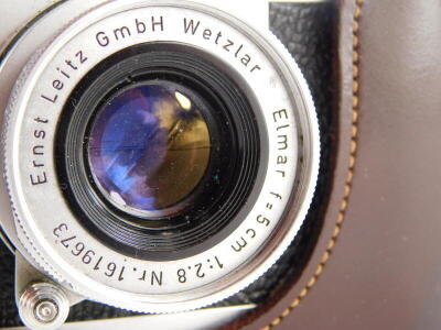 A Leica IIIG camera, serial number 981064, with a Leitz 5cm f2.8 Elmar lens, number 1619673, in a leather case. - 2