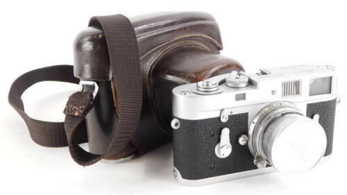 A Leica M2 camera, serial number 1069861, with a Leitz 5cm f2 Summicron lens, number 1326017.