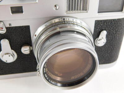 A Leica M2 camera, serial number 1069861, with a Leitz 5cm f2 Summicron lens, number 1326017. - 3