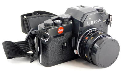 A black Leica R3 single lens reflex camera, with a Leitz 28mm f2.8 Elmarit R wide angle lens, number 2726096.