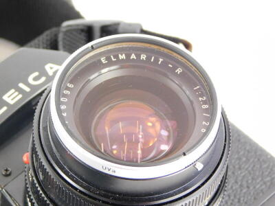 A black Leica R3 single lens reflex camera, with a Leitz 28mm f2.8 Elmarit R wide angle lens, number 2726096. - 2