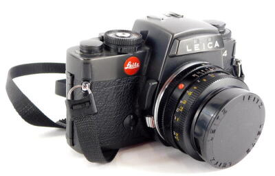 A black Leica R4 single lens reflex camera, with a Leitz Summicron 50mm f2 lens, number 2666242.