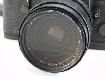 A black Leicaflex SL2 SLR camera, with a Leitz 35-70mm Vario-Elmar zoom lens, and a Leitz Elmarit R 135mm f2.8 telephoto lens, in camera case. - 3