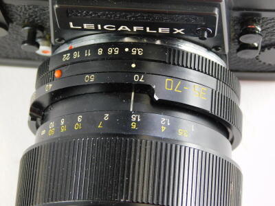 A black Leicaflex SL2 SLR camera, with a Leitz 35-70mm Vario-Elmar zoom lens, and a Leitz Elmarit R 135mm f2.8 telephoto lens, in camera case. - 4