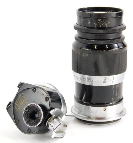 A Leitz 9cm f4 Elmar Telephoto lens, with screw fit, serial number 260001, with accessory viewfinder.