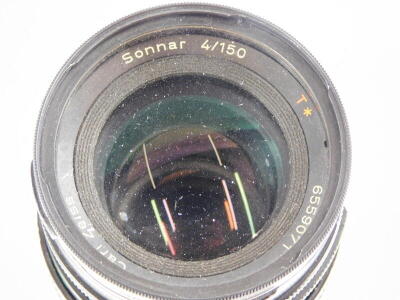 A Carl Zeiss Sonnar 150mm f4 lens, number 6559071, for a Hasselblad camera, with Hasselblad branding, etc. - 3